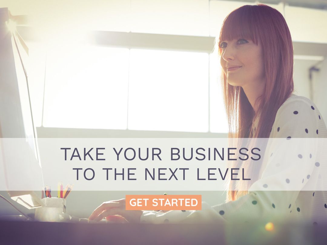 Motivated Woman Working at Computer Representing Business Progress