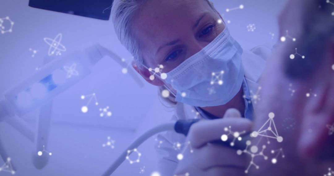 Dentist with Protective Mask Using Digital Technology in Modern Clinic