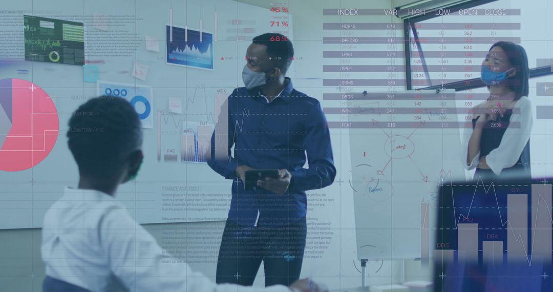Diverse Professionals in Office Analyzing Financial Data with Face Masks