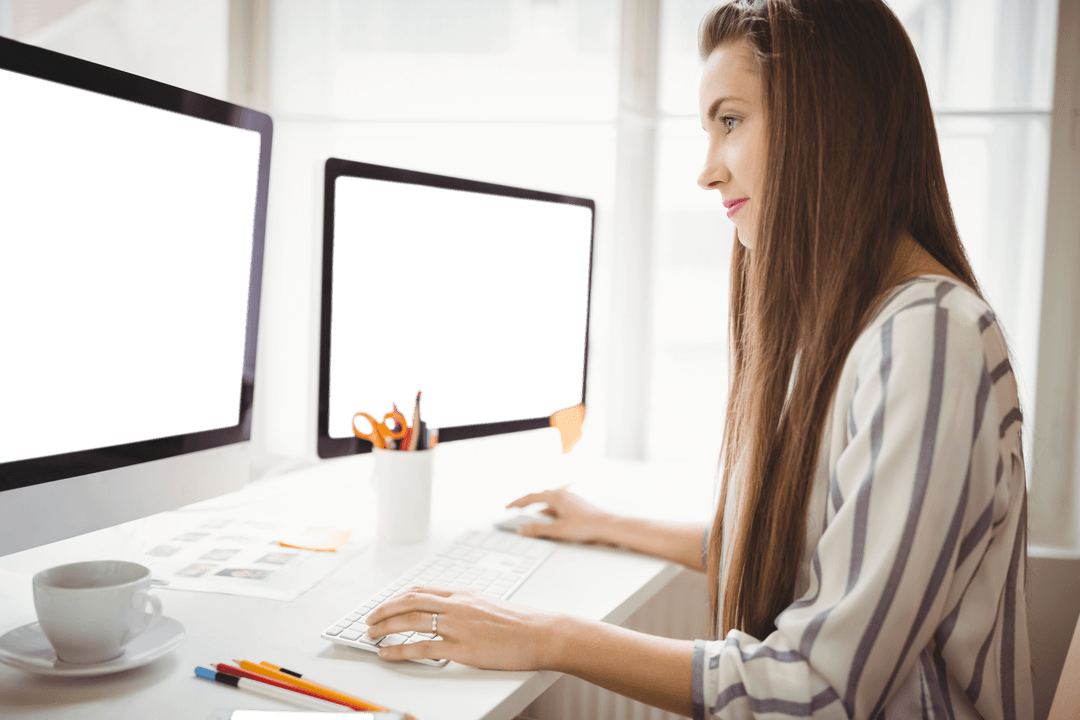 Professional Woman Working in Bright Office with Transparent Computer Screens