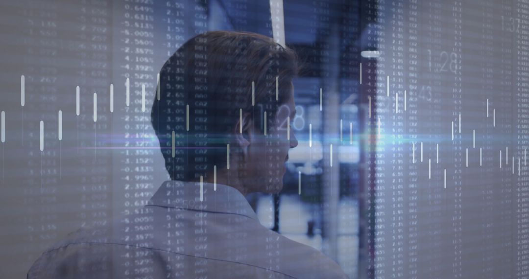 Business Professional Analyzing Data with Digital Chart Overlay