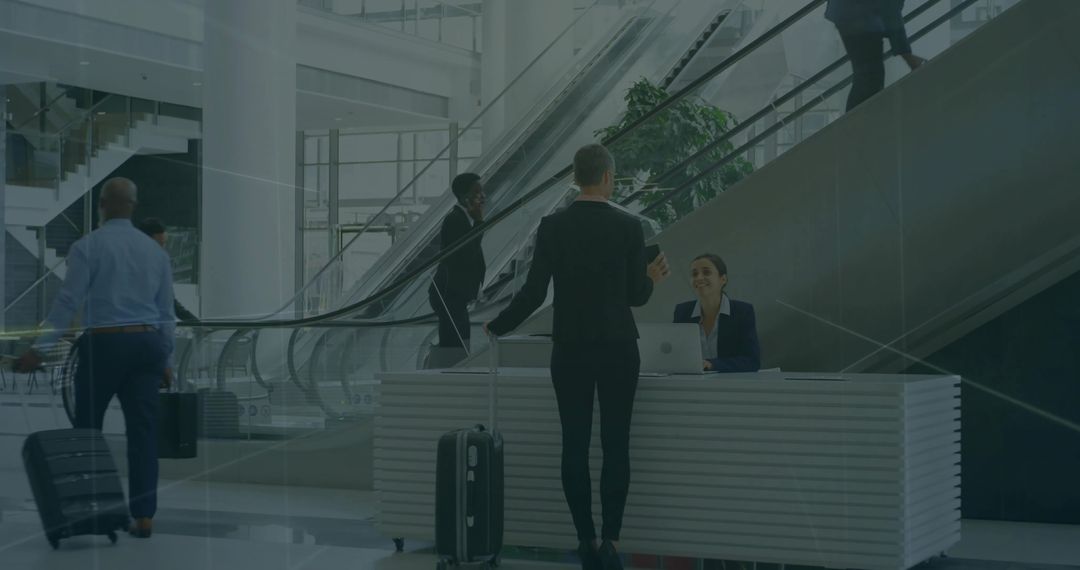 Business Traveler Engaging with Hotel Reception in Modern Lobby