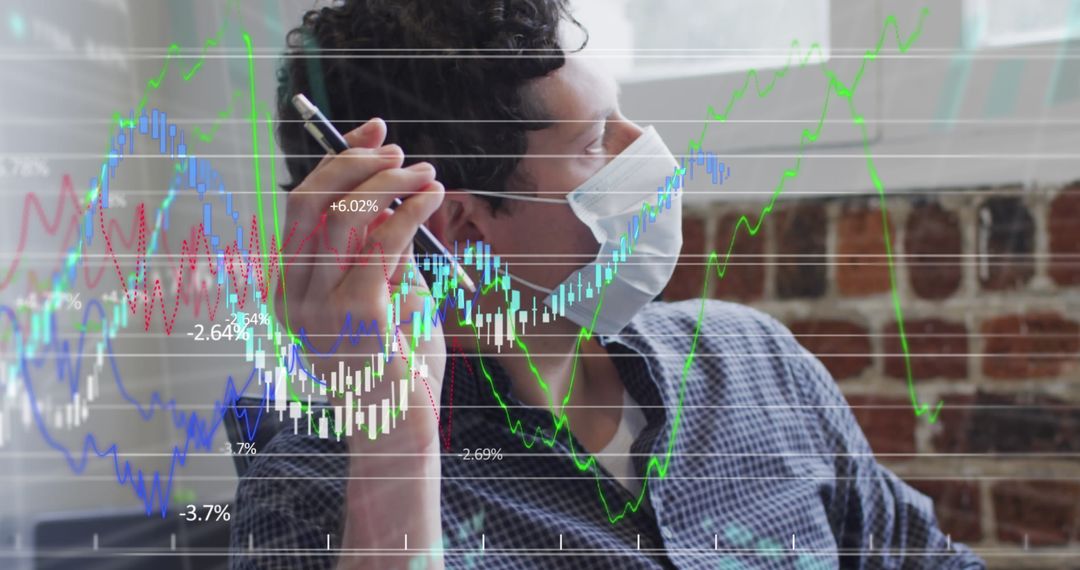 Businessman Analyzing Financial Data with Mask during Pandemic