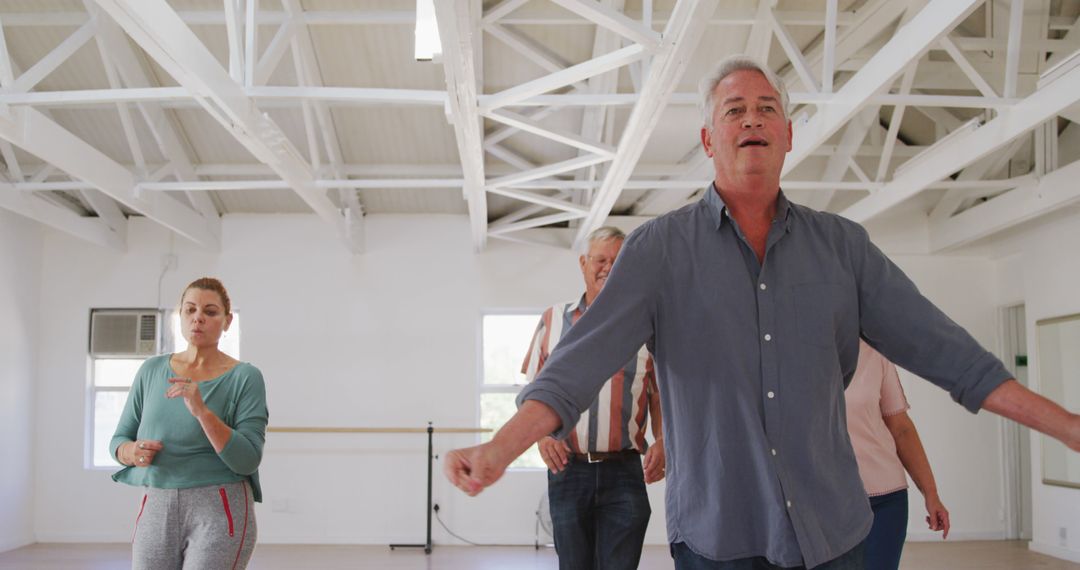 Group of Seniors Practicing Dance in Bright Studio - Free Images, Stock Photos and Pictures on Pikwizard.com