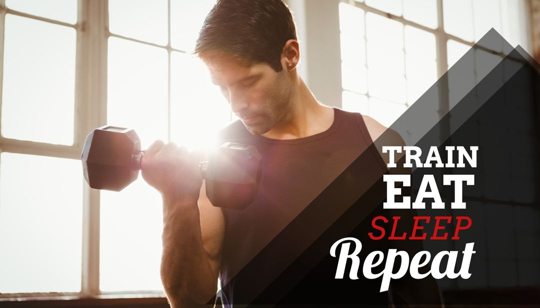 Man Lifting Dumbbell in Gym Highlighting Fitness Motivation