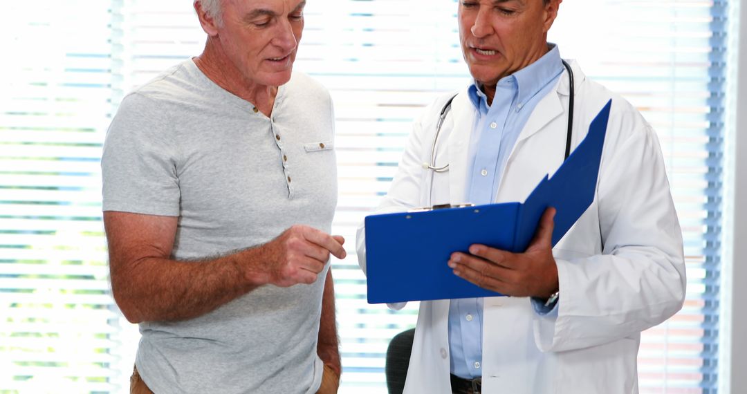 Doctor Discussing Test Results with Elderly Patient - Free Images, Stock Photos and Pictures on Pikwizard.com