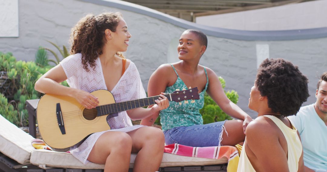 Joyful Group Gathering: Guitar and Singing at Pool Party