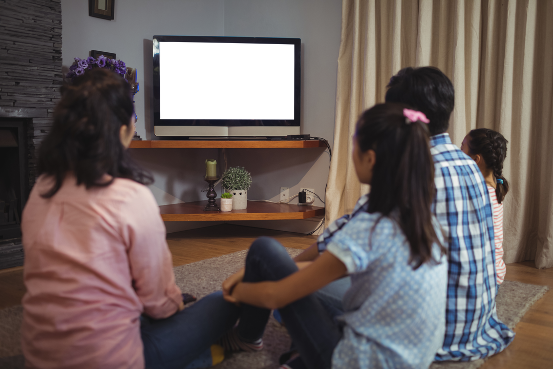 Family Watching Transparent Television in Cozy Living Room Setting - Download Free Stock Images Pikwizard.com