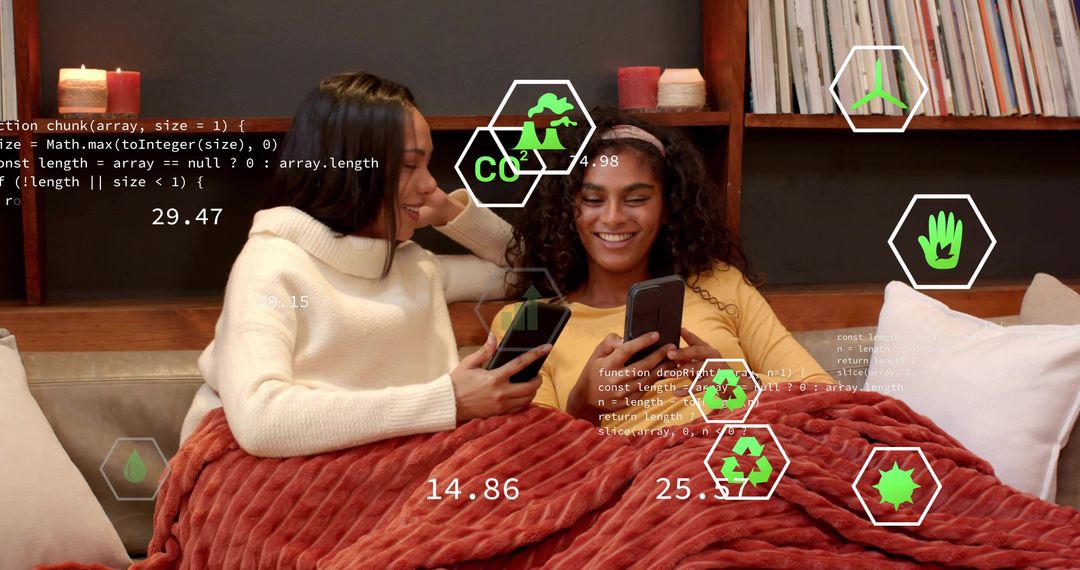 Two Women Relaxing on Couch Using Smartphones with Augmented Reality Eco Overlays