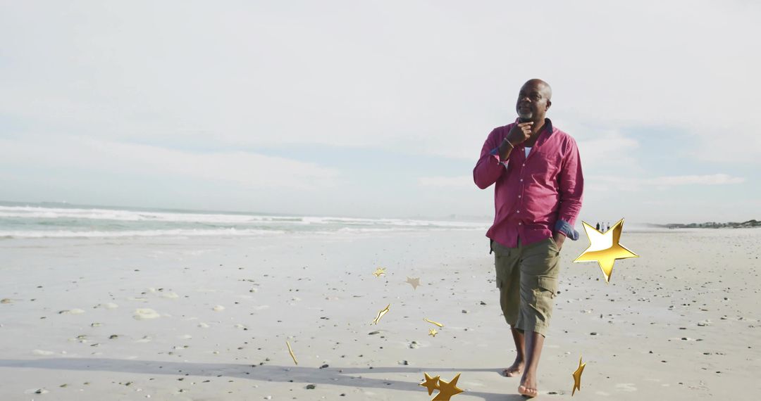 Man Strolling on Sandy Quiet Beach with Star Decorations