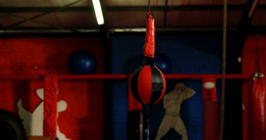 Punching Speed Bag Hanging in Gym with Boxing Equipment - Free Images, Stock Photos and Pictures on Pikwizard.com