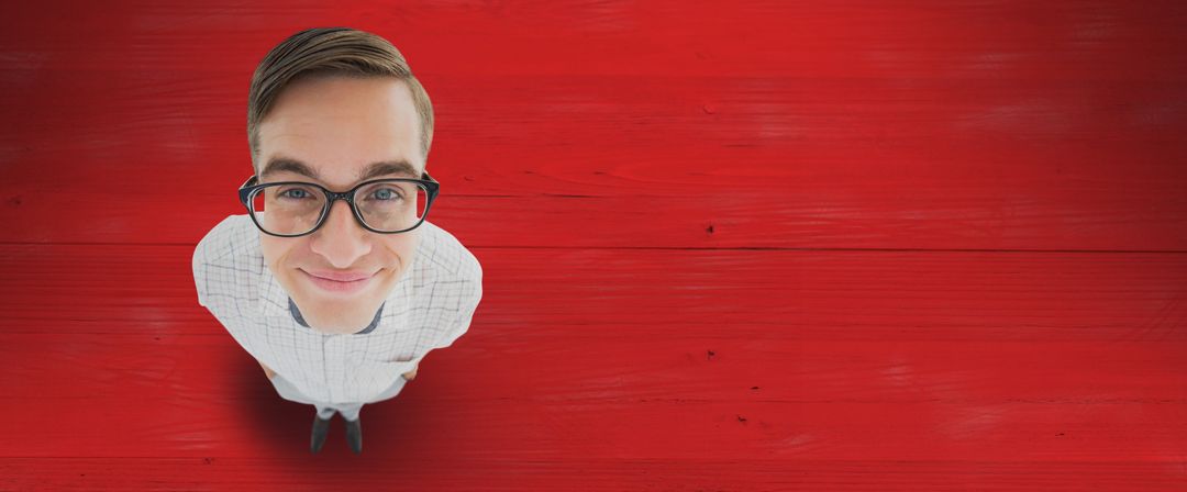 Man Smiling Against Red Wooden Background Conveying Friendliness