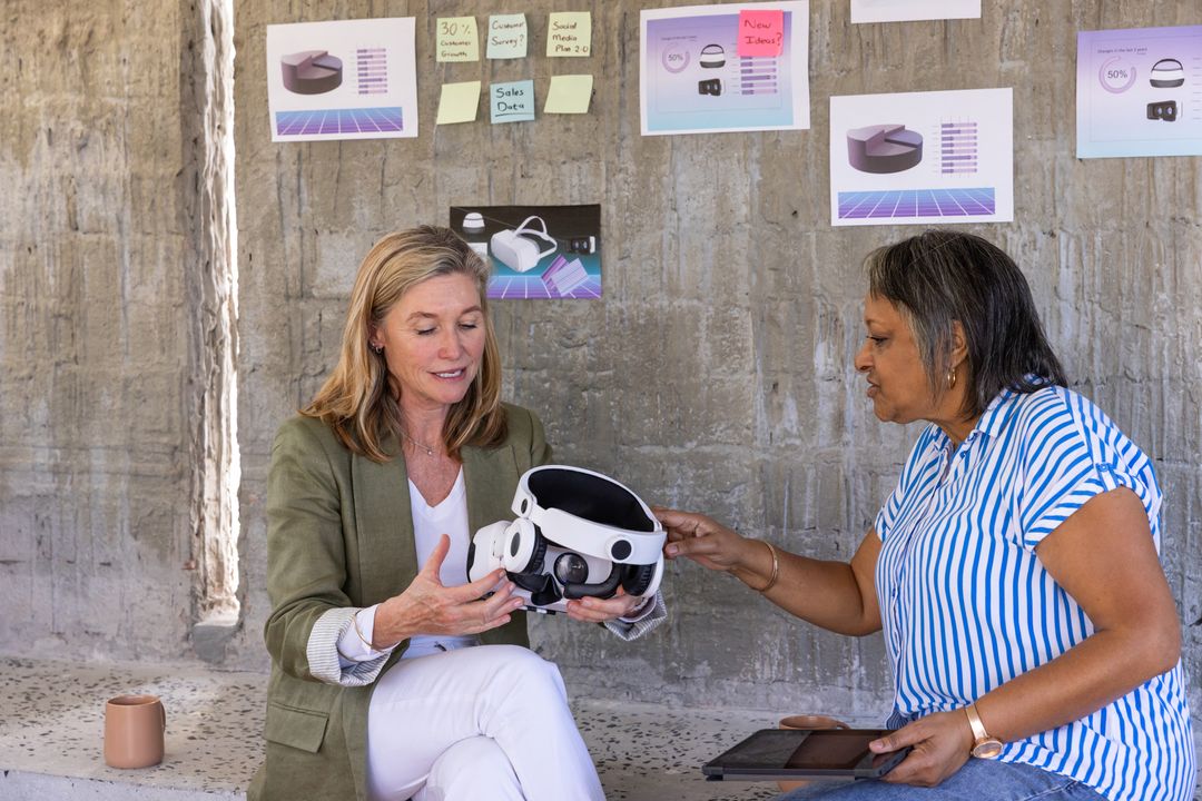Colleagues Collaborating on VR Headset Prototype Design