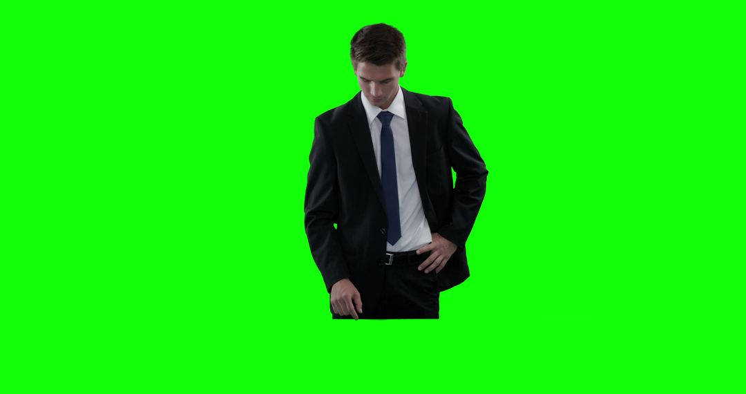 Businessman Interacting with Virtual Interface on Green Screen