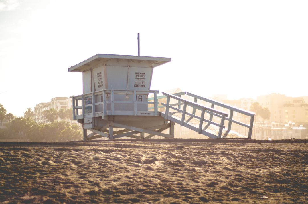 Sunny Beach Lifeguard Tower at Sunset - Free Images, Stock Photos and Pictures on Pikwizard.com