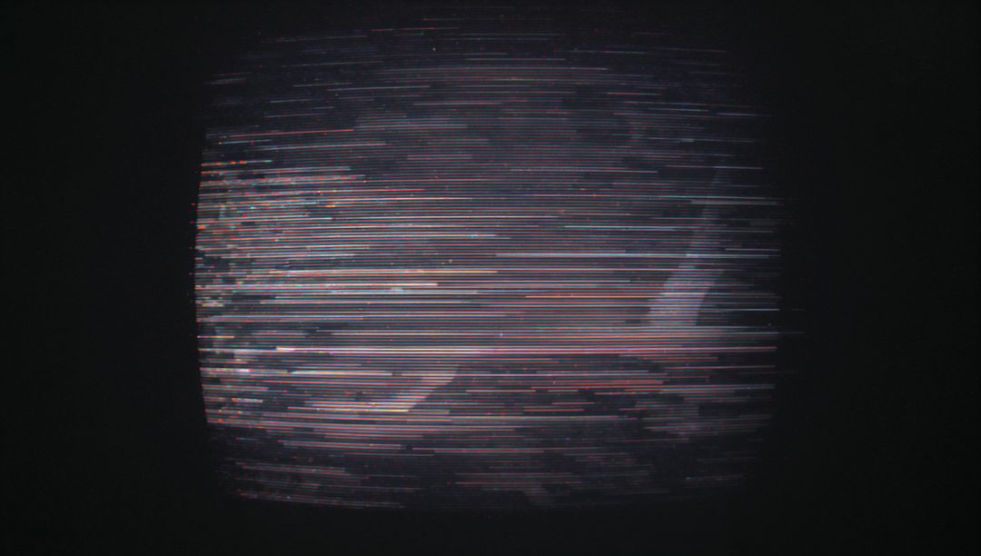 Glitching Television Screen with Flickering Multicolored Static