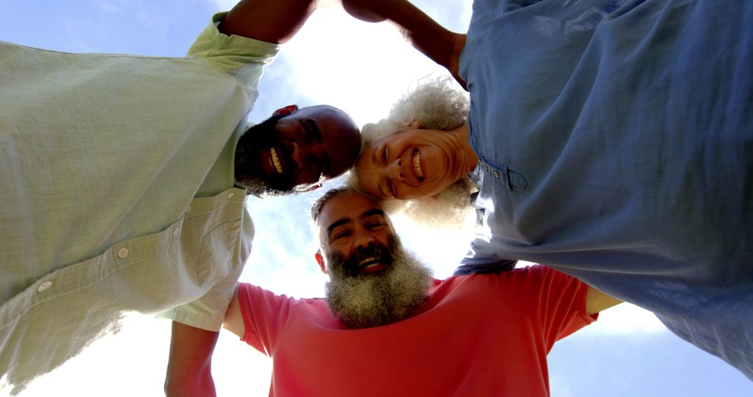 Senior Friends Embracing with Joyful Expressions