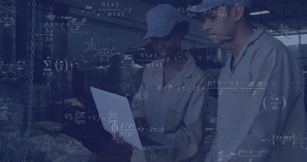 Technicians Analyzing Data on Pharmaceutical Plant Floor