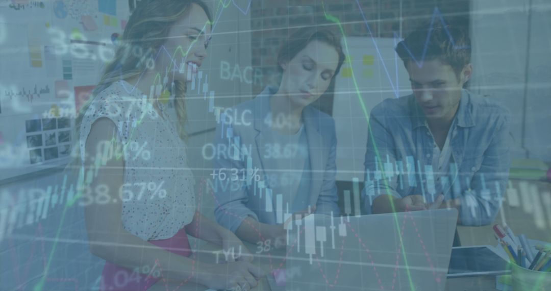 Diverse Team Analyzing Stock Market Data for Strategic Planning