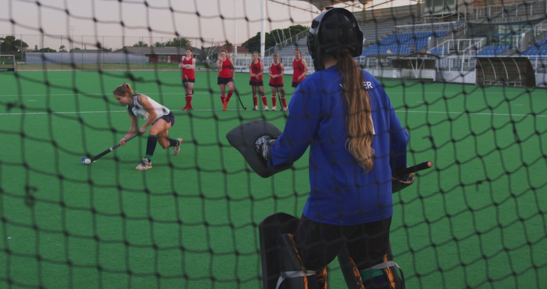 Goalkeeper preparing to block field hockey penalty shot - Free Images, Stock Photos and Pictures on Pikwizard.com