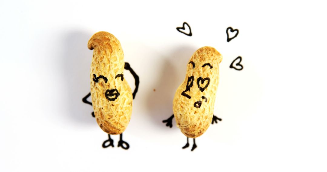 Cute Peanuts with Hand-Drawn Faces and Hearts - Free Images, Stock Photos and Pictures on Pikwizard.com