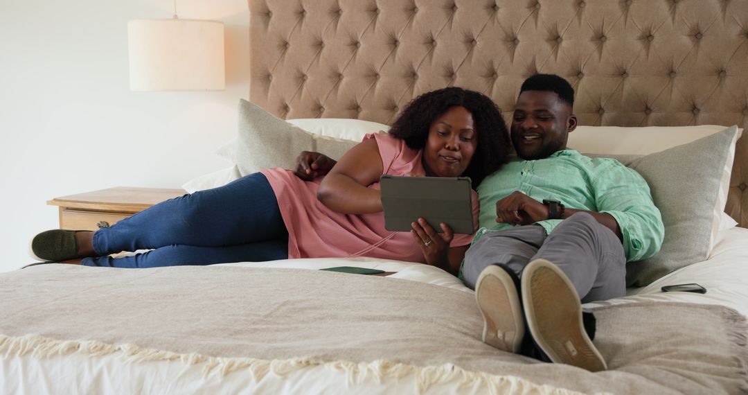 Comfortable Sofa as Side Table for Night Lamp and Green Pillow