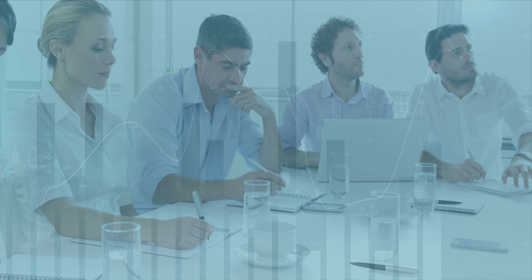 Diverse Team Collaborating in a Financial Meeting with Data Overlay