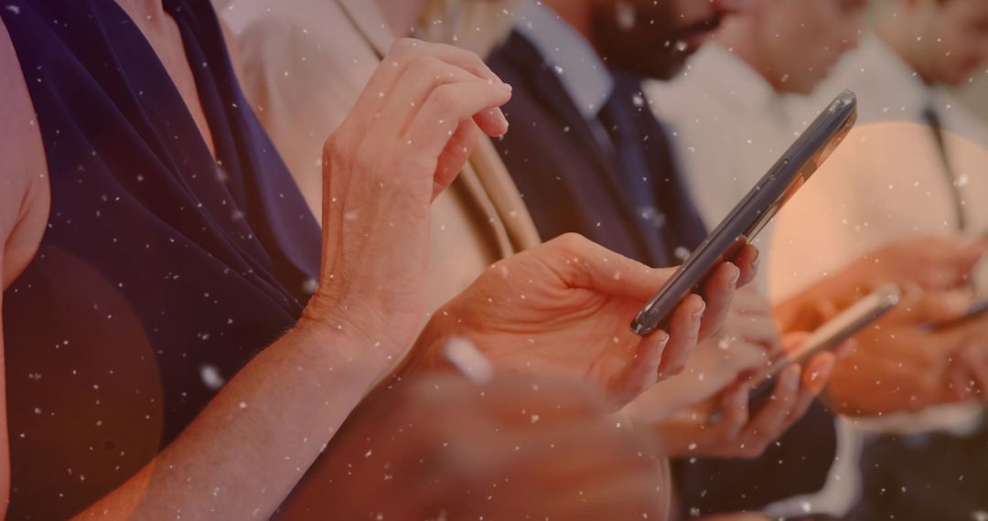 Business People Using Smartphones with Snowfall Effect