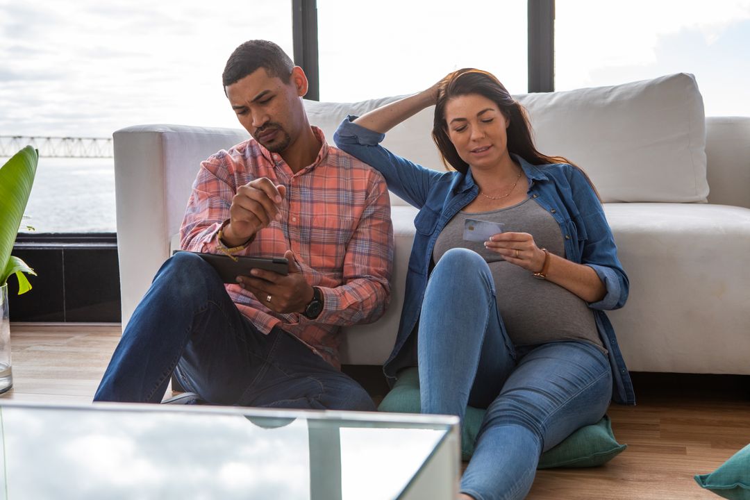 Diverse Women Using Tablet for Online Shopping at Home