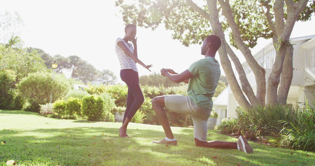 Surprised Woman Receiving Marriage Proposal in a Park - Free Images, Stock Photos and Pictures on Pikwizard.com