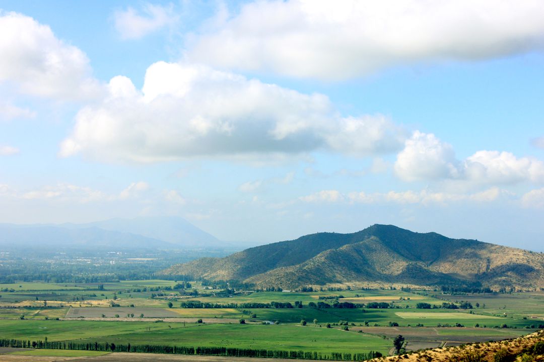 Panoramic Landscape with Rolling Hills and Blue Sky - Free Images, Stock Photos and Pictures on Pikwizard.com