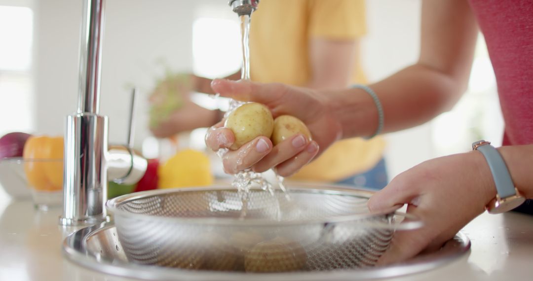 Washing Fresh Potatoes in Kitchen Sink - Free Images, Stock Photos and Pictures on Pikwizard.com