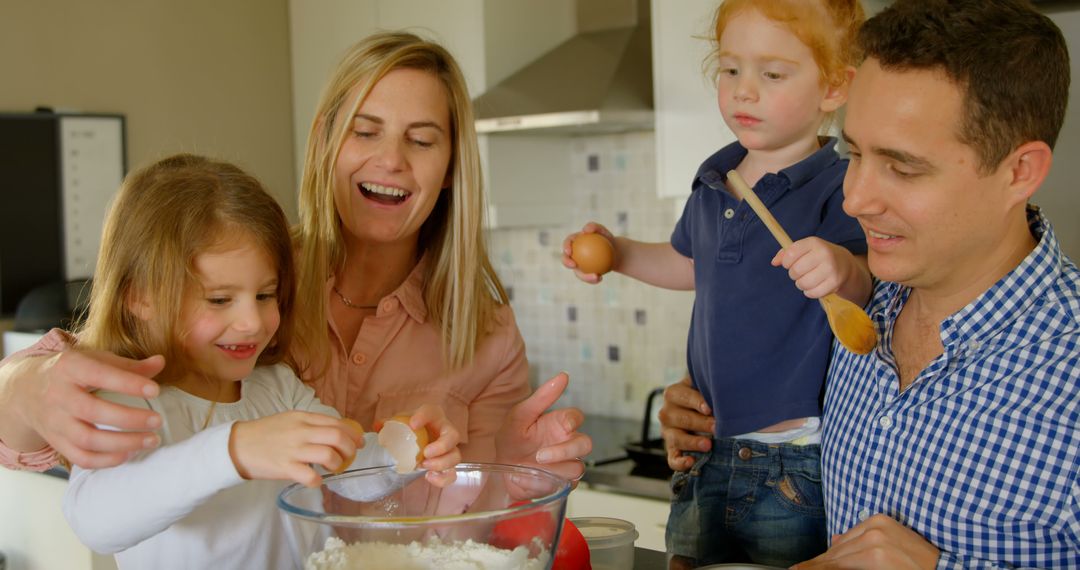 Happy Family Baking in Kitchen, Children Helping Parents - Free Images, Stock Photos and Pictures on Pikwizard.com