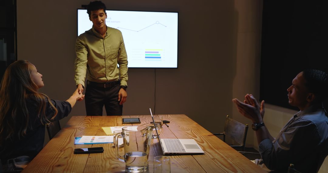 Business Professionals Collaborating on Project Presentation