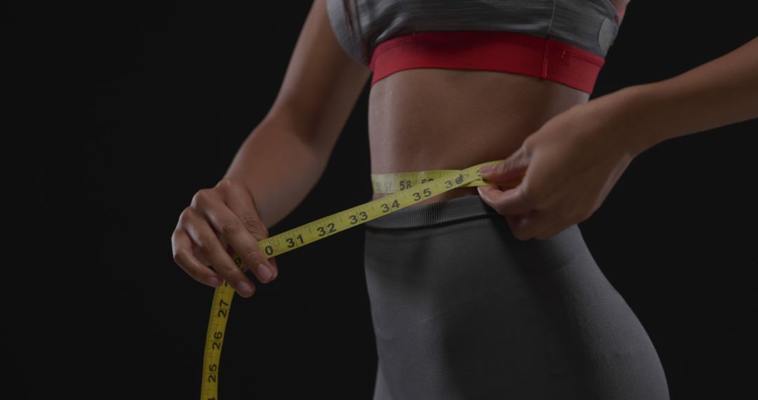 Woman Measuring Waist with Tape, Fitness and Health Concept - Free Images, Stock Photos and Pictures on Pikwizard.com