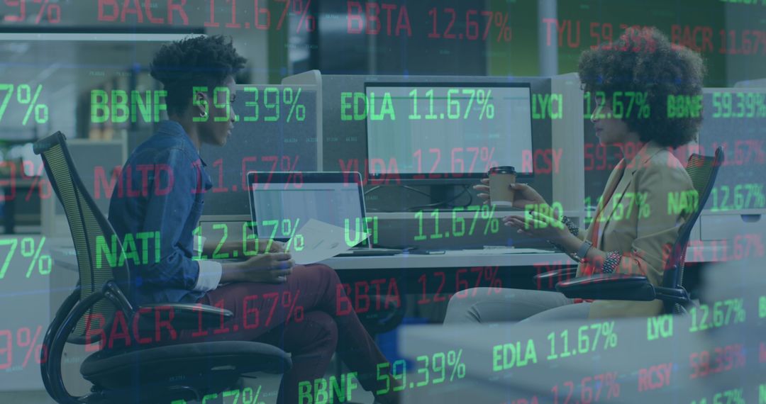 Businesswomen Analyzing Financial Data Overlays