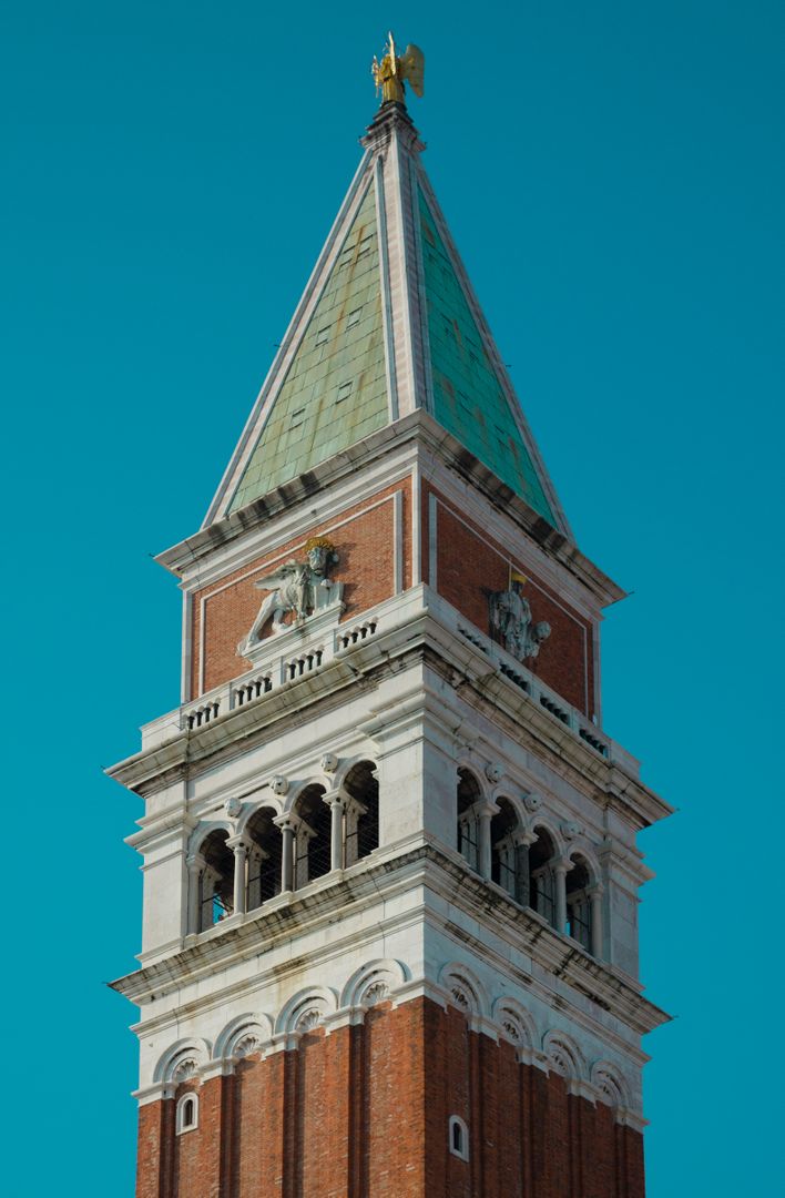 St Mark's Campanile Against Clear Blue Sky in Venice - Free Images, Stock Photos and Pictures on Pikwizard.com