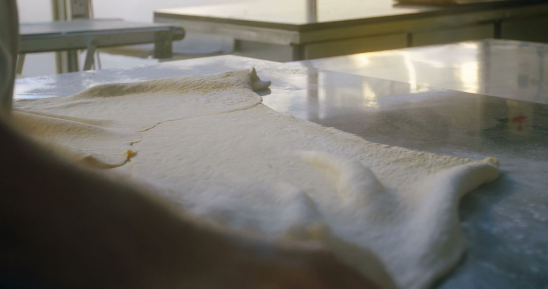 Close-up of Chef Preparing Dough on Stainless Steel Surface - Free Images, Stock Photos and Pictures on Pikwizard.com