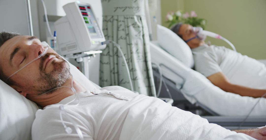 Patients Resting in Hospital Beds with Oxygen Assistance - Free Images, Stock Photos and Pictures on Pikwizard.com