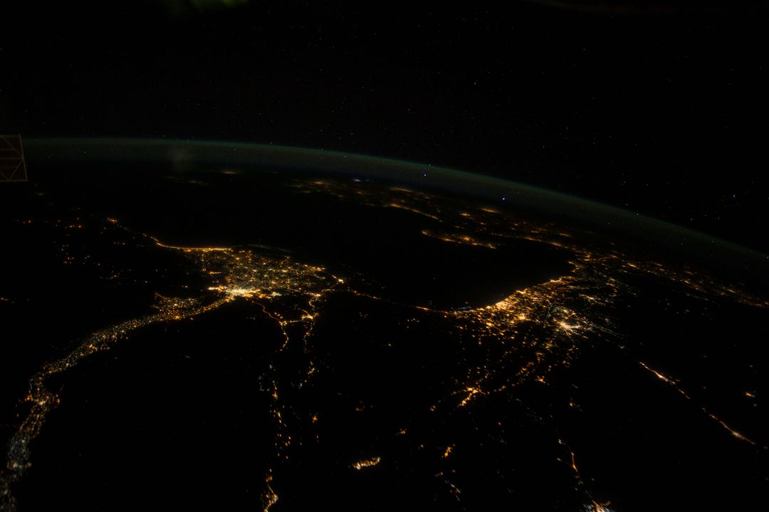 Night View from Space of Middle Eastern Cities Illuminated - Free Images, Stock Photos and Pictures on Pikwizard.com