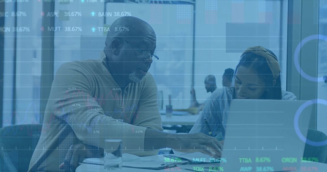 Diverse Professionals Analyzing Financial Data Together