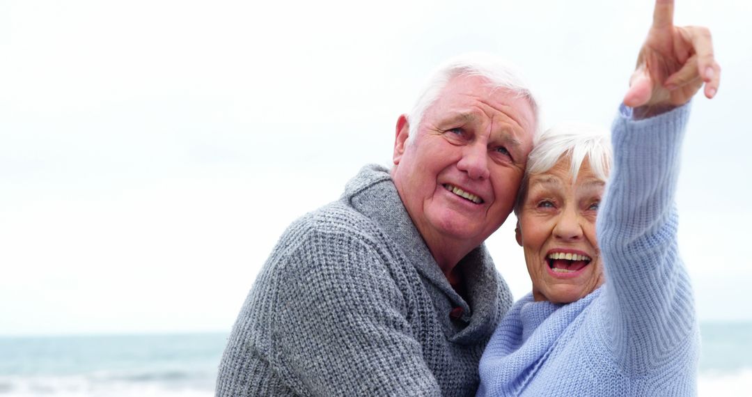 Happy Senior Couple Enjoying a Day at the Beach - Free Images, Stock Photos and Pictures on Pikwizard.com