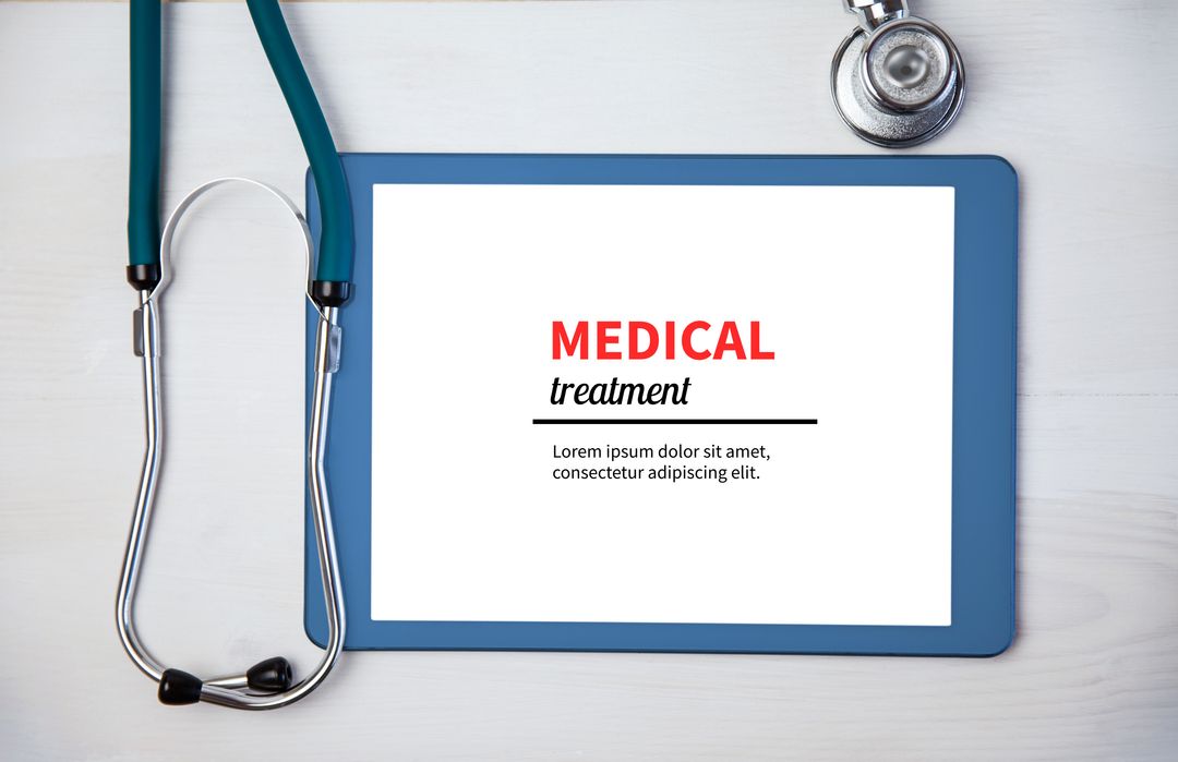 Tablet with Medical Treatment Text and Stethoscope on Desk