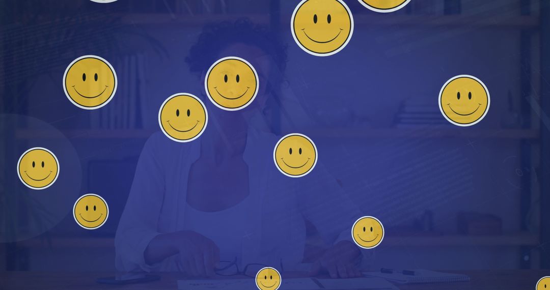 Smiling Emojis Over Biracial Woman in Video Call, Global Connection Concept