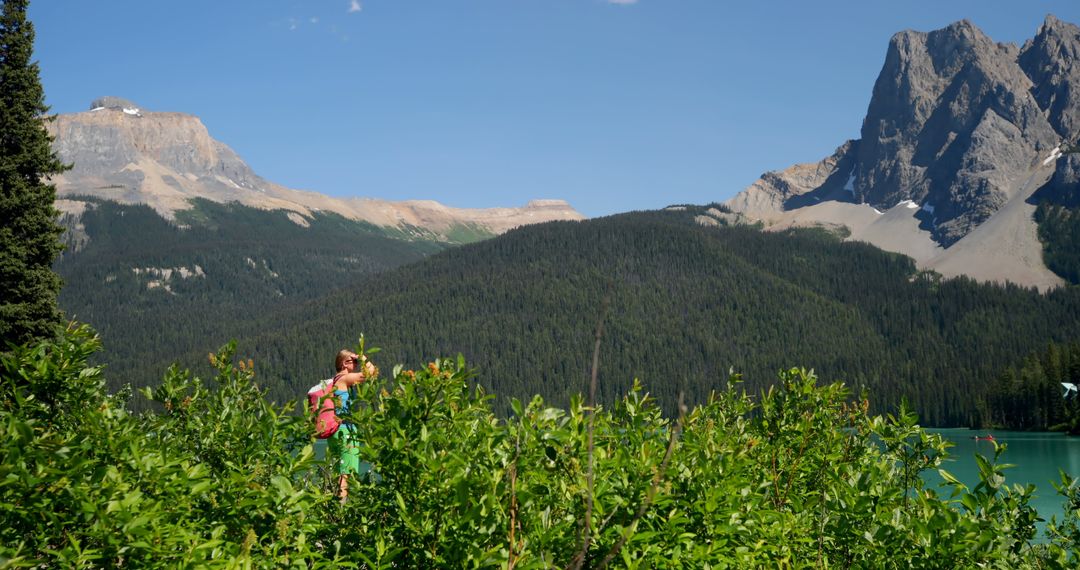 Woman Hiking on Mountain Trail with Scenic Landscape - Free Images, Stock Photos and Pictures on Pikwizard.com