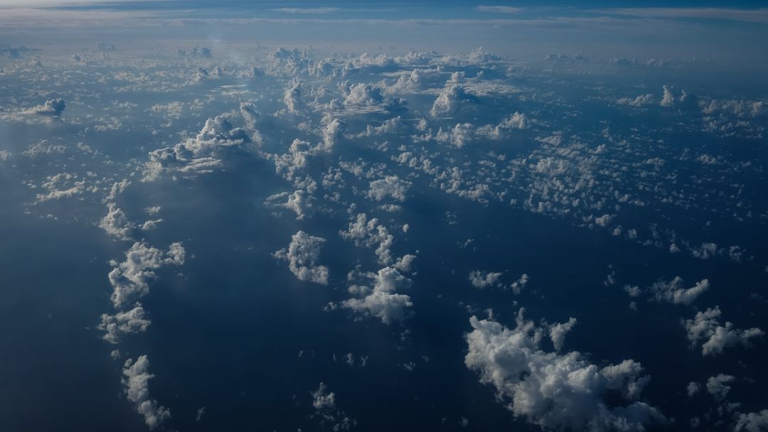 Dramatic Aerial View of Clouds over Ocean at Dusk - Free Images, Stock Photos and Pictures on Pikwizard.com