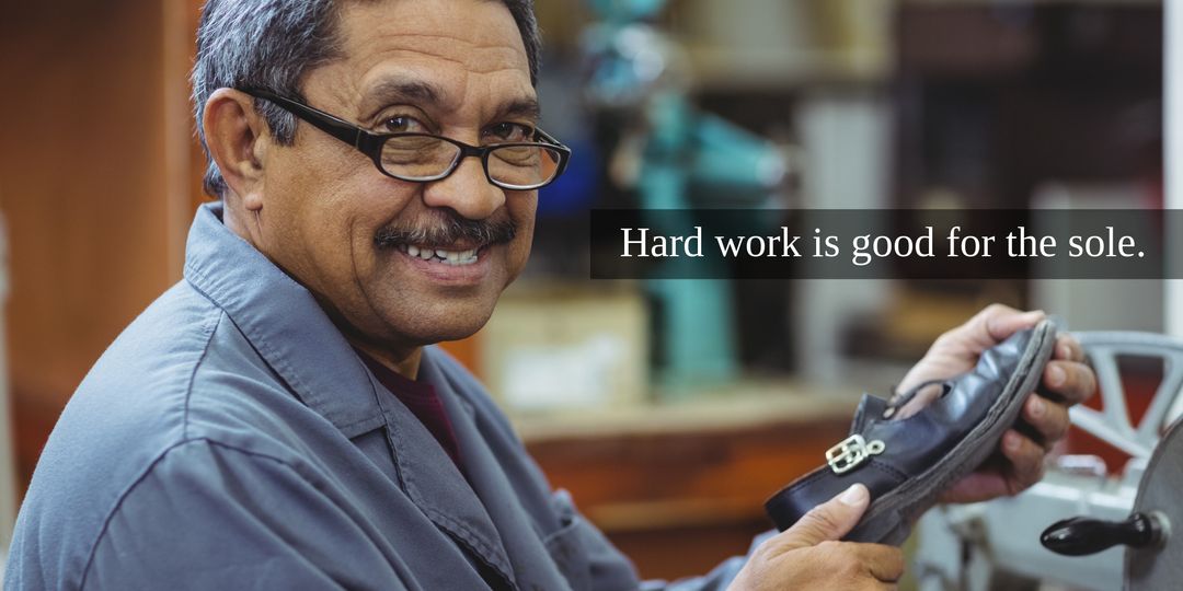 Experienced Cobbler Smiling While Repairing Shoe in Workshop - Download Free Stock Templates Pikwizard.com