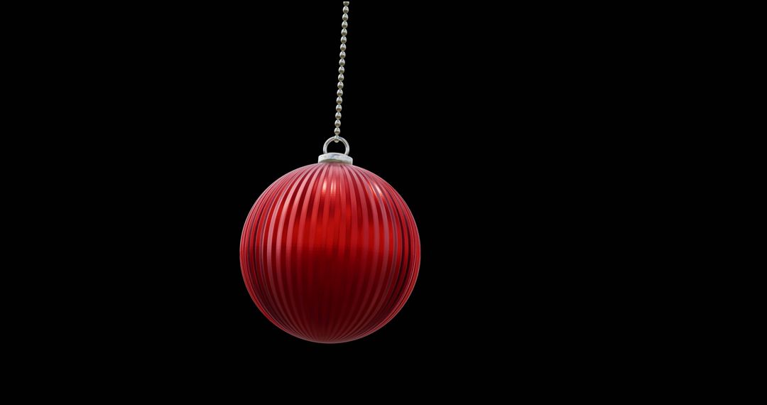 Red Christmas Ornament Hanging on Black Background - Free Images, Stock Photos and Pictures on Pikwizard.com