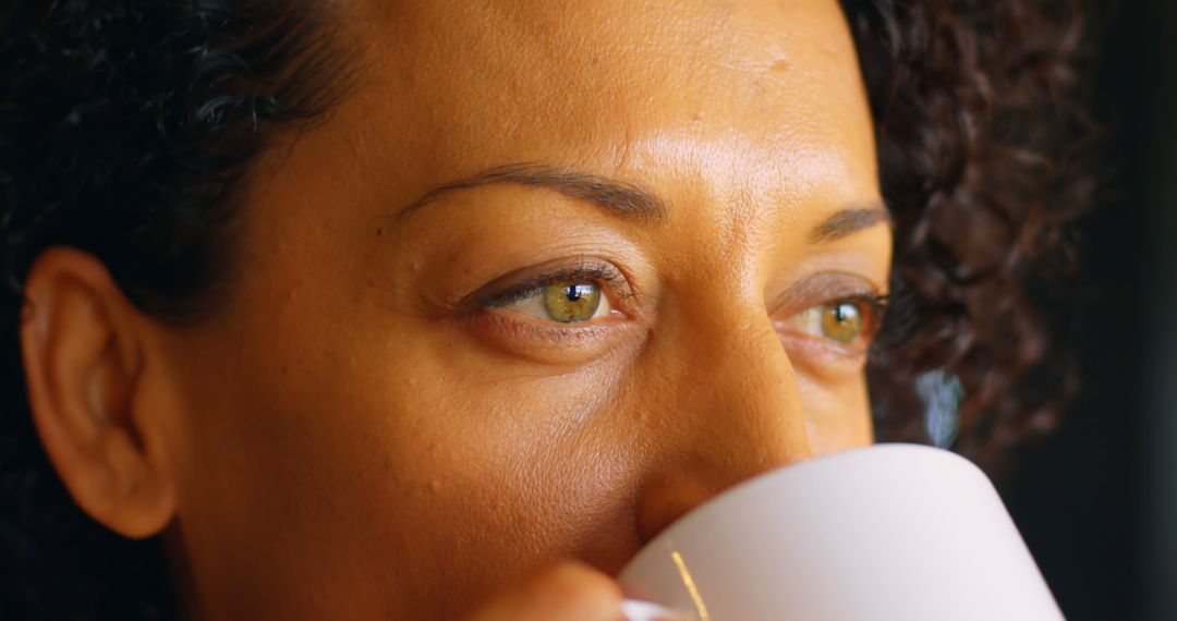 Close-up of Woman Drinking Coffee, Reflective Moment - Free Images, Stock Photos and Pictures on Pikwizard.com