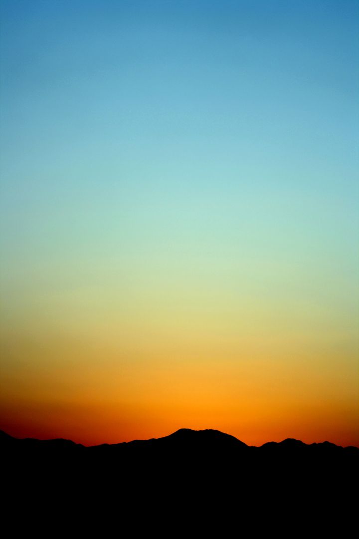 Silhouette of Mountain Under Orange and Blue Sky during Sunset - Free Images, Stock Photos and Pictures on Pikwizard.com